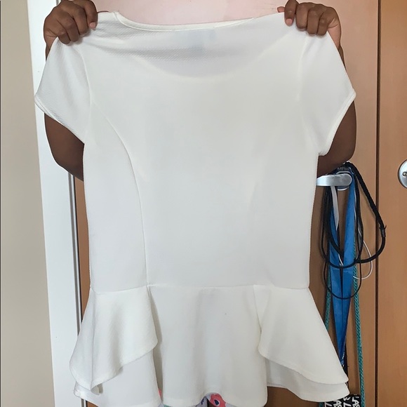 A white blouse with an attached gold necklace. - Picture 2 of 2